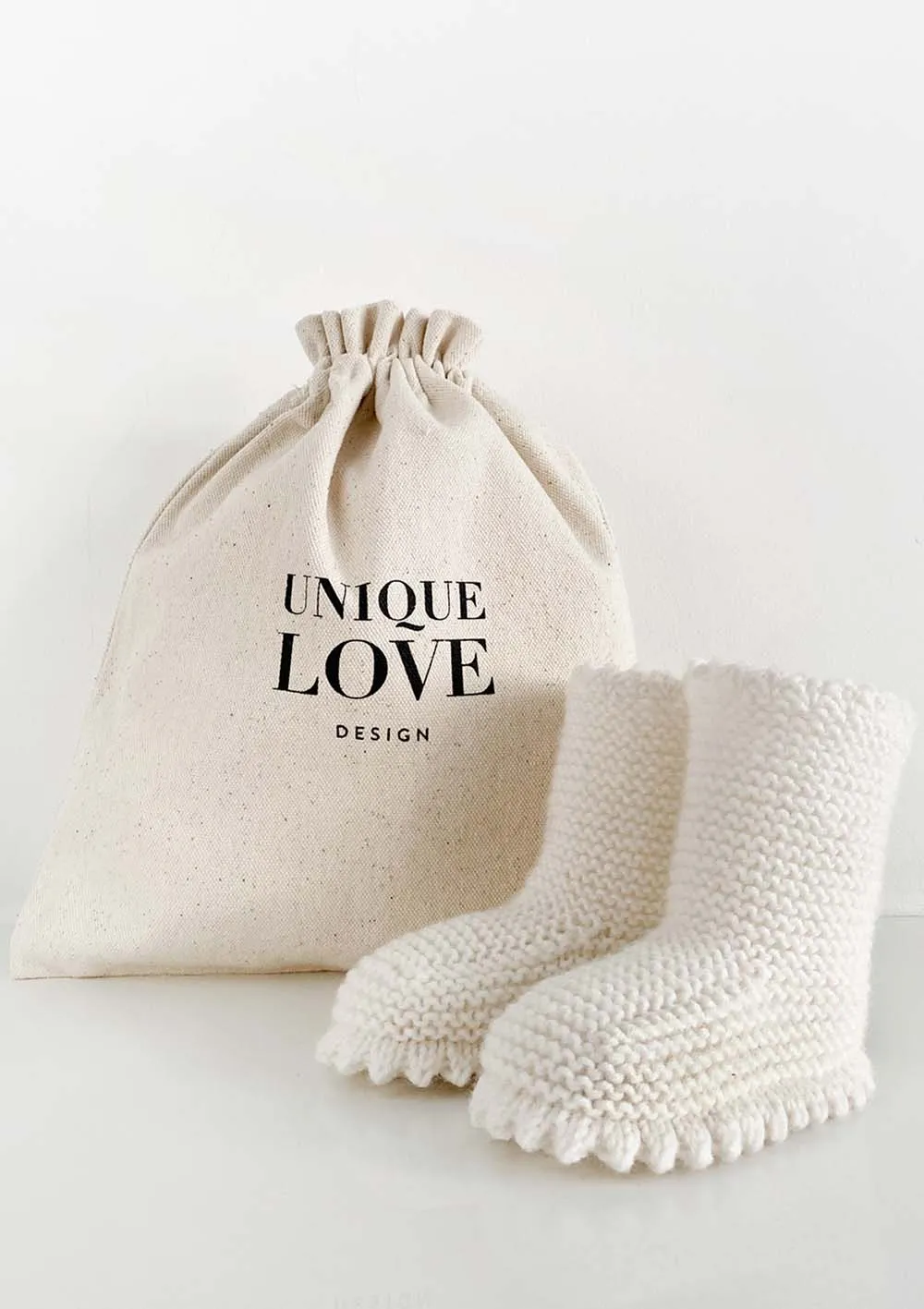 Strickschuhe Boots Creme